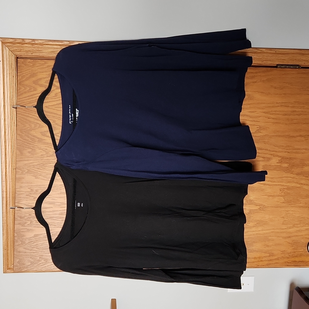 Selling 2 long sleeve t shirts together,  both size 2x, one blue,  one black